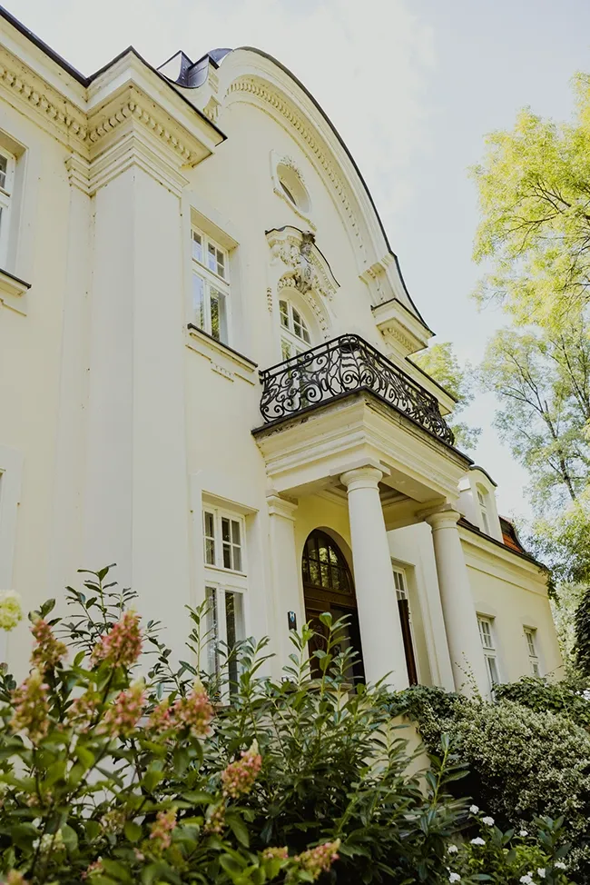 The portico with its wrought-iron balcony